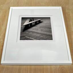 Photographie d'art et collection Denis Olivier, Night Loneliness, Pyla's Dune, France. Avril 2005. Ref-613 - Denis Olivier Photographie, cadre blanc sur une table en bois
