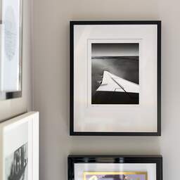 Art and collection photography Denis Olivier, Above, KL1278, North Sea, Netherlands. August 2022. Ref-11636 - Denis Olivier Photography, original fine-art photograph signed in limited edition in a black wooden frame with other images hung on the wall