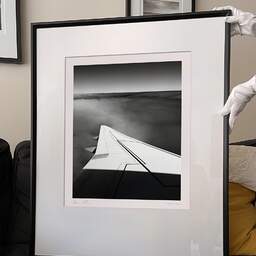 Art and collection photography Denis Olivier, Above, KL1278, North Sea, Netherlands. August 2022. Ref-11636 - Denis Olivier Art Photography, large original 9 x 9 inches fine-art photograph print in limited edition and signed hold by a galerist woman