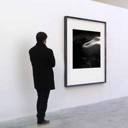 Art and collection photography Denis Olivier, Anne, Poitiers, France. April 1990. Ref-998 - Denis Olivier Art Photography, A visitor contemplate a large original photographic art print in limited edition and signed in a black frame