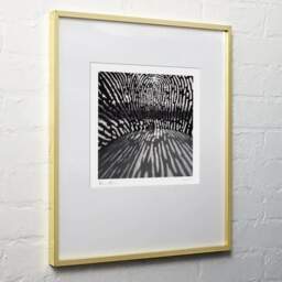 Art and collection photography Denis Olivier, Aterpe Fingerprint Sculpture, Bilbao, Spain. February 2022. Ref-11591 - Denis Olivier Photography, light wood frame on white wall