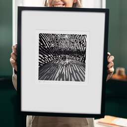 Art and collection photography Denis Olivier, Aterpe Fingerprint Sculpture, Bilbao, Spain. February 2022. Ref-11591 - Denis Olivier Art Photography, original 9 x 9 inches fine-art photograph print in limited edition and signed hold by a galerist woman