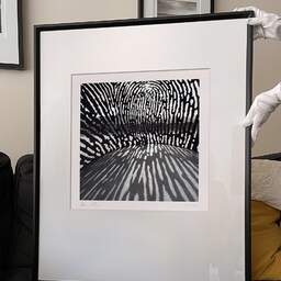 Art and collection photography Denis Olivier, Aterpe Fingerprint Sculpture, Bilbao, Spain. February 2022. Ref-11591 - Denis Olivier Photography, large original 9 x 9 inches fine-art photograph print in limited edition and signed hold by a galerist woman