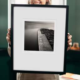 Art and collection photography Denis Olivier, Barrage De La Rance, France, France. August 2005. Ref-754 - Denis Olivier Photography, original 9 x 9 inches fine-art photograph print in limited edition and signed hold by a galerist woman
