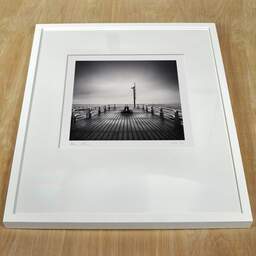 Art and collection photography Denis Olivier, Beach Walk, Koksijde Bad, Belgium. October 2008. Ref-11514 - Denis Olivier Photography, white frame on a wooden table