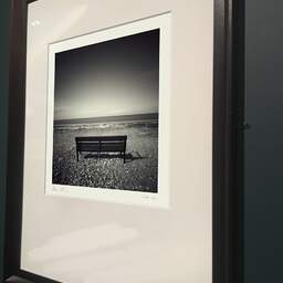 Art and collection photography Denis Olivier, Bench, LLandulas Beach, Wales. April 2006. Ref-947 - Denis Olivier Art Photography, brown wood old frame on dark gray background