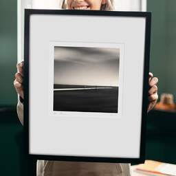 Art and collection photography Denis Olivier, Beyond The Horizon, Brittany, France. August 2005. Ref-1127 - Denis Olivier Photography, original 9 x 9 inches fine-art photograph print in limited edition and signed hold by a galerist woman
