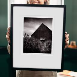 Art and collection photography Denis Olivier, Bunker Entrance, Newburgh, Aberdeenshire, Scotland. August 2022. Ref-11613 - Denis Olivier Art Photography, original 9 x 9 inches fine-art photograph print in limited edition and signed hold by a galerist woman