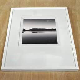 Art and collection photography Denis Olivier, Calm At Dusk, Etude 1, Lake Tikitapu, Bay Of Plenty, New Zealand. July 2018. Ref-11442 - Denis Olivier Photography, white frame on a wooden table