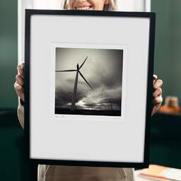 Art and collection photography Denis Olivier, Causeymire Wind Farm, Achkeepster Hill, Scotland. April 2006. Ref-970 - Denis Olivier Photography, original 9 x 9 inches fine-art photograph print in limited edition and signed hold by a galerist woman