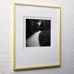 Art and collection photography Denis Olivier, Curved Path, Plaisance-du-Touch, France. June 2021. Ref-11463 - Denis Olivier Art Photography, light wood frame on white wall
