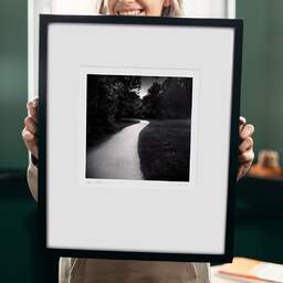 Art and collection photography Denis Olivier, Curved Path, Plaisance-du-Touch, France. June 2021. Ref-11463 - Denis Olivier Art Photography, original 9 x 9 inches fine-art photograph print in limited edition and signed hold by a galerist woman