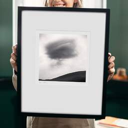 Art and collection photography Denis Olivier, Dark Cloud, Staffin Coast, Scotland. August 2022. Ref-11575 - Denis Olivier Photography, original 9 x 9 inches fine-art photograph print in limited edition and signed hold by a galerist woman