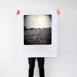 Art and collection photography Denis Olivier, Dorian Standings In The Field, Coperit, France. April 2007. Ref-1077 - Denis Olivier Art Photography, Large original photographic art print in limited edition and signed tenu par un homme