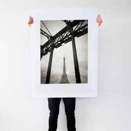 Art and collection photography Denis Olivier, Eiffel Tower, Debilly Footbridge, Paris, France. February 2022. Ref-11662 - Denis Olivier Photography, Large original photographic art print in limited edition and signed tenu par un homme