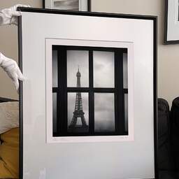 Art and collection photography Denis Olivier, Eiffel Tower, Paris, France. February 2018. Ref-1371 - Denis Olivier Art Photography, large original 9 x 9 inches fine-art photograph print in limited edition and signed hold by a galerist woman