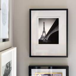 Art and collection photography Denis Olivier, Eiffel Tower Sunrise, Paris, France. February 2022. Ref-11625 - Denis Olivier Photography, original fine-art photograph signed in limited edition in a black wooden frame with other images hung on the wall