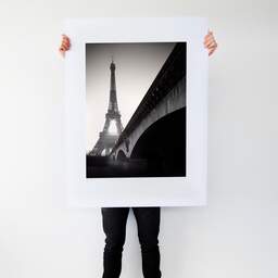 Art and collection photography Denis Olivier, Eiffel Tower Sunrise, Paris, France. February 2022. Ref-11625 - Denis Olivier Art Photography, Large original photographic art print in limited edition and signed tenu par un homme