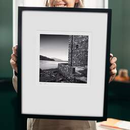 Art and collection photography Denis Olivier, Eilean Donan Castle, Etude 2, Highlands, Scotland. August 2022. Ref-11581 - Denis Olivier Photography, original 9 x 9 inches fine-art photograph print in limited edition and signed hold by a galerist woman