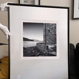 Art and collection photography Denis Olivier, Eilean Donan Castle, Etude 2, Highlands, Scotland. August 2022. Ref-11581 - Denis Olivier Photography, large original 9 x 9 inches fine-art photograph print in limited edition and signed hold by a galerist woman