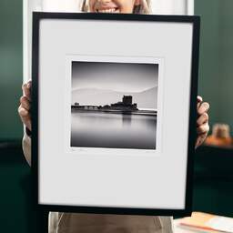 Art and collection photography Denis Olivier, Eilean Donan Castle, Etude 3, Highlands, Scotland. August 2022. Ref-11594 - Denis Olivier Art Photography, original 9 x 9 inches fine-art photograph print in limited edition and signed hold by a galerist woman