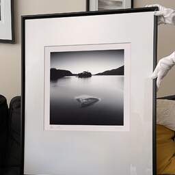 Art and collection photography Denis Olivier, Emerging Sand, Loch Awe, Scotland. August 2022. Ref-11582 - Denis Olivier Photography, large original 9 x 9 inches fine-art photograph print in limited edition and signed hold by a galerist woman