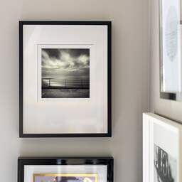 Art and collection photography Denis Olivier, Evening Seaside, Ramsgate Beach, England. April 2006. Ref-935 - Denis Olivier Photography, original fine-art photograph signed in limited edition in a black wooden frame with other images hung on the wall