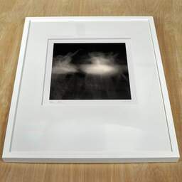 Art and collection photography Denis Olivier, Ghost Opera, Etude 14, The Swan Lake, Berlin, Germany. April 1998. Ref-864 - Denis Olivier Art Photography, white frame on a wooden table