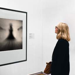 Art and collection photography Denis Olivier, Ghost Opera, Etude 18. September 2007. Ref-1103 - Denis Olivier Art Photography, A woman contemplate a large original photographic art print in limited edition and signed in a black frame