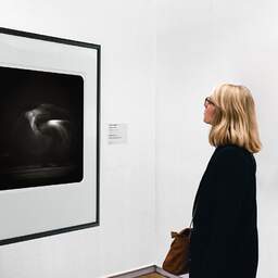 Art and collection photography Denis Olivier, Ghost Opera, Etude 31. February 2009. Ref-1210 - Denis Olivier Art Photography, A woman contemplate a large original photographic art print in limited edition and signed in a black frame