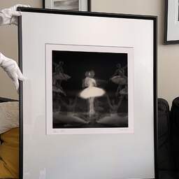 Art and collection photography Denis Olivier, Ghost Opera, Etude 32, The Swan Lake, Berlin, Germany. April 1998. Ref-11468 - Denis Olivier Photography, large original 9 x 9 inches fine-art photograph print in limited edition and signed hold by a galerist woman