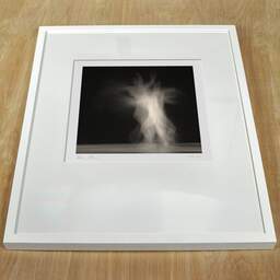Art and collection photography Denis Olivier, Ghost Opera, Etude 21. November 2006. Ref-1061 - Denis Olivier Photography, white frame on a wooden table