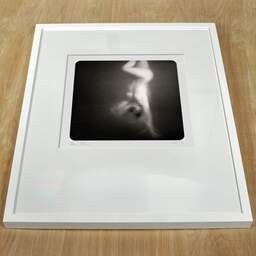 Art and collection photography Denis Olivier, Ghost Opera, Etude 26. October 2007. Ref-1108 - Denis Olivier Photography, white frame on a wooden table