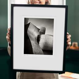 Art and collection photography Denis Olivier, Guggenheim Museum, Etude 2, Bilbao, Spain. February 2022. Ref-11635 - Denis Olivier Photography, original 9 x 9 inches fine-art photograph print in limited edition and signed hold by a galerist woman
