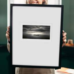 Art and collection photography Denis Olivier, Halfway To Daylight, Saintes-Maries-De-La-Mer, France. October 2007. Ref-1147 - Denis Olivier Photography, original 9 x 9 inches fine-art photograph print in limited edition and signed hold by a galerist woman