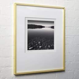Art and collection photography Denis Olivier, Immersed Stones, Loch Garry, Scotland. August 2022. Ref-11595 - Denis Olivier Photography, light wood frame on white wall