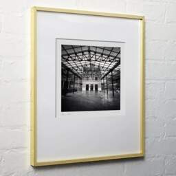 Art and collection photography Denis Olivier, International Rail Station, Canfranc, Spain. February 2022. Ref-11525 - Denis Olivier Photography, light wood frame on white wall