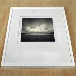 Art and collection photography Denis Olivier, Loch Linnhe, Etude 1, Glencoe, Scotland. April 2006. Ref-954 - Denis Olivier Art Photography, white frame on a wooden table