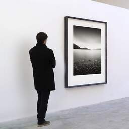 Art and collection photography Denis Olivier, Loch Linnhe, Onich, Fort William, Scotland. August 2022. Ref-11653 - Denis Olivier Photography, A visitor contemplate a large original photographic art print in limited edition and signed in a black frame