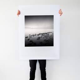 Art and collection photography Denis Olivier, Low Tide Rocks, Saint-Georges-de-Didonne, France. October 2020. Ref-1424 - Denis Olivier Art Photography, Large original photographic art print in limited edition and signed tenu par un homme