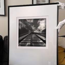 Art and collection photography Denis Olivier, Montparnasse Tower, Paris, France. May 2005. Ref-647 - Denis Olivier Photography, large original 9 x 9 inches fine-art photograph print in limited edition and signed hold by a galerist woman