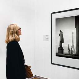 Art and collection photography Denis Olivier, Musée De L'Homme, Etude 2, Palais De Chaillot, Paris, France. February 2022. Ref-11667 - Denis Olivier Photography, A woman contemplate a large original photographic art print in limited edition and signed in a black frame