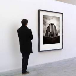Art and collection photography Denis Olivier, Notre-Dame Church, Etude 1, Royan, France. August 2021. Ref-11605 - Denis Olivier Art Photography, A visitor contemplate a large original photographic art print in limited edition and signed in a black frame