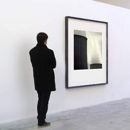 Art and collection photography Denis Olivier, Nuclear Power Plant, Etude 4, Golfech, France. August 2006. Ref-1033 - Denis Olivier Art Photography, A visitor contemplate a large original photographic art print in limited edition and signed in a black frame