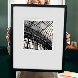 Art and collection photography Denis Olivier, Orsay Museum Glass Roof I, Paris, France. February 2005. Ref-561 - Denis Olivier Photography, original 9 x 9 inches fine-art photograph print in limited edition and signed hold by a galerist woman