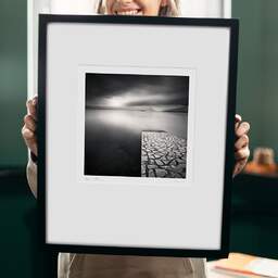 Art and collection photography Denis Olivier, Paved Ramp, Etude 1, Lake Maggiore, Italy. August 2014. Ref-1302 - Denis Olivier Art Photography, original 9 x 9 inches fine-art photograph print in limited edition and signed hold by a galerist woman
