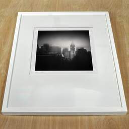 Art and collection photography Denis Olivier, Philadelphia Skyline, United-States, United-States. October 2009. Ref-1240 - Denis Olivier Photography, white frame on a wooden table