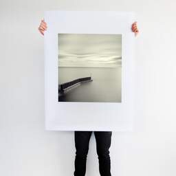 Art and collection photography Denis Olivier, Pier End, Keiss Harbour Broch, Scotland. April 2006. Ref-984 - Denis Olivier Art Photography, Large original photographic art print in limited edition and signed tenu par un homme