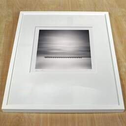 Art and collection photography Denis Olivier, Pier In Silence, Netherlands, Netherlands. April 2015. Ref-1316 - Denis Olivier Photography, white frame on a wooden table