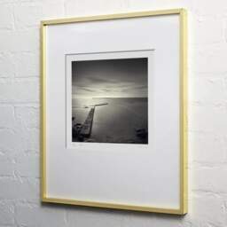 Art and collection photography Denis Olivier, Piers, Keiss Harbour, Scotland. April 2006. Ref-1054 - Denis Olivier Photography, light wood frame on white wall